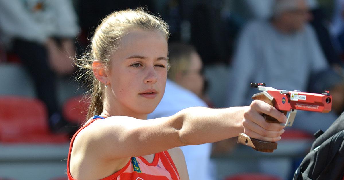 Gabrielle shooting in competition